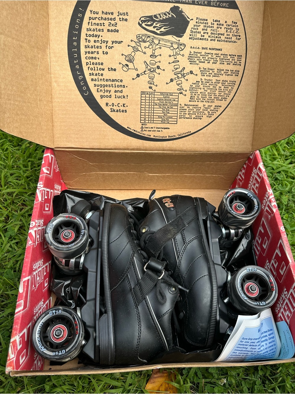 Black Quad Roller Skates with Red-Accented Wheels